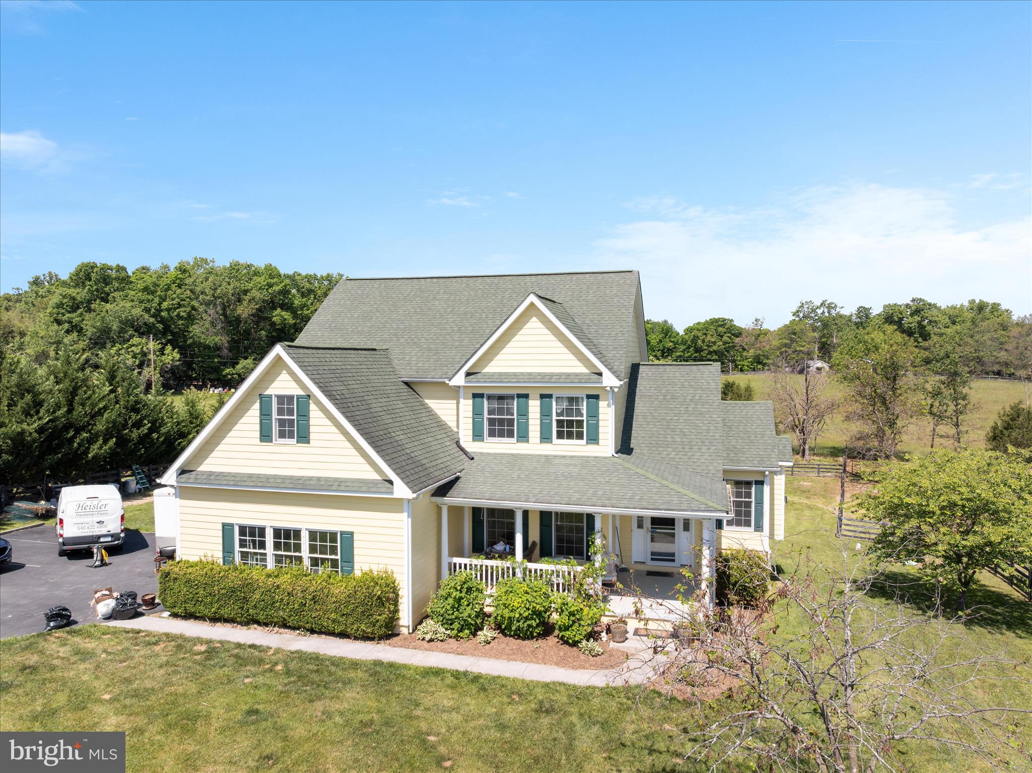 1200 Salem Church Road Stephens City, VA 22655 - Photo 50 of 69 a front view of a house with a yard and potted plants