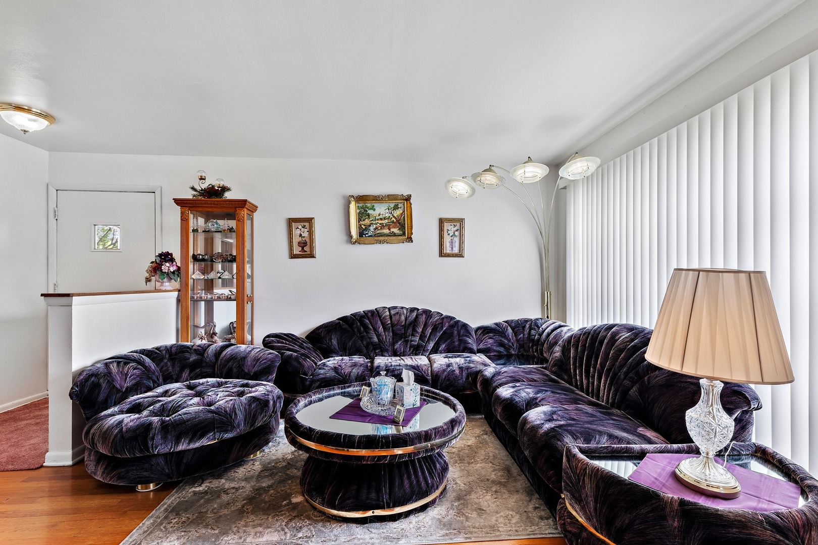 216 West Plainfield Road Countryside, IL 60525 - Photo 5 of 20 a living room with furniture and a window