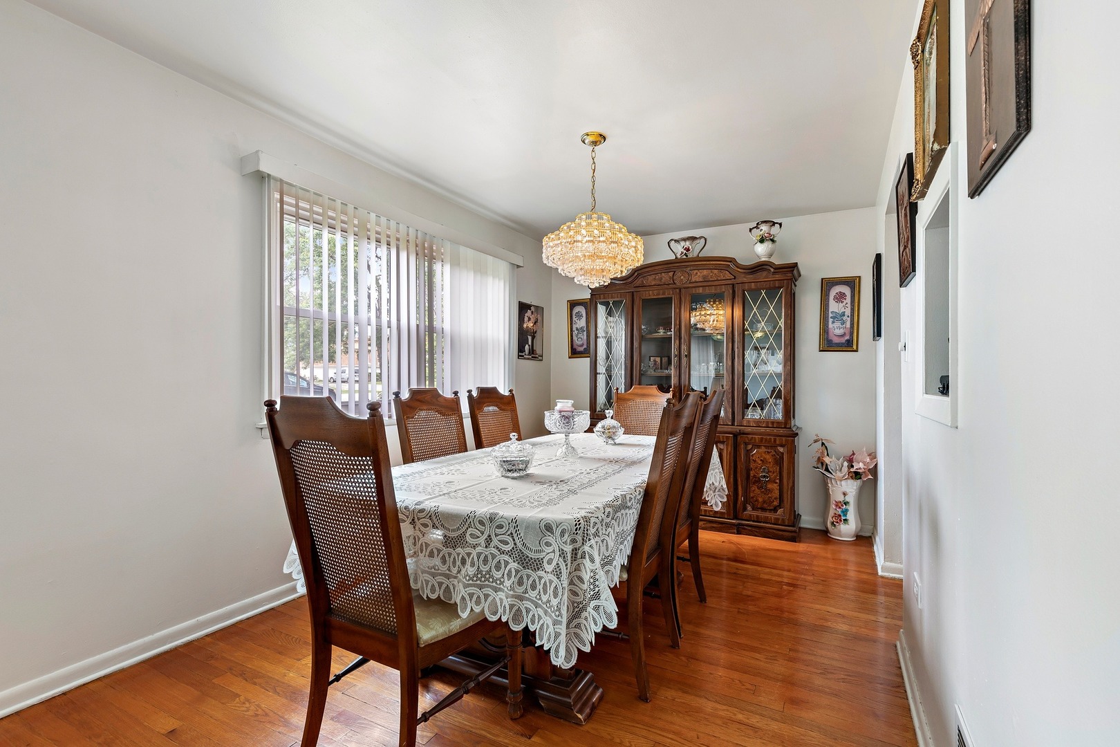 216 West Plainfield Road Countryside, IL 60525 - Photo 7 of 20 a view of a dining room with furniture window and wooden floor