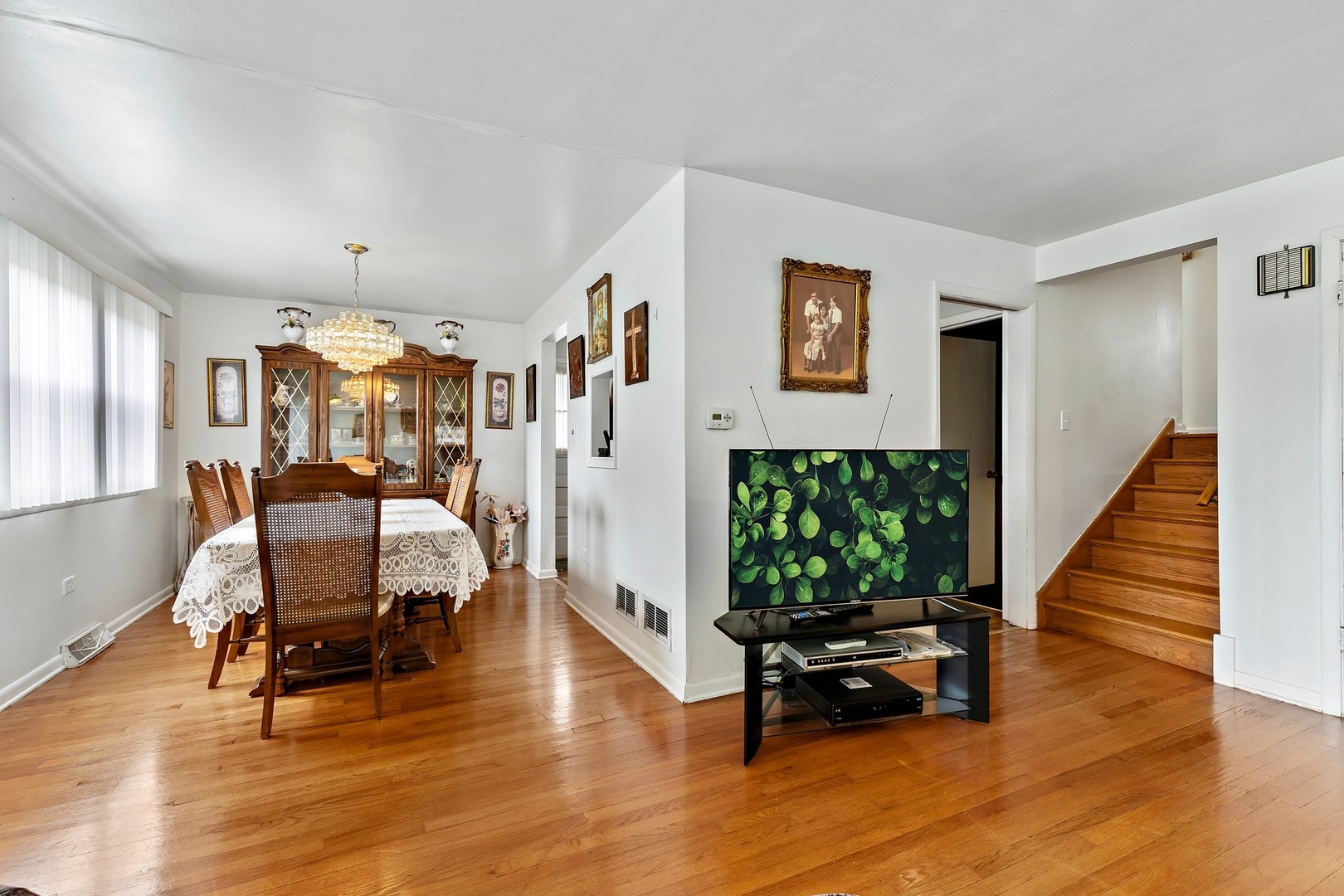 216 West Plainfield Road Countryside, IL 60525 - Photo 8 of 20 a living room with furniture and a wooden floor
