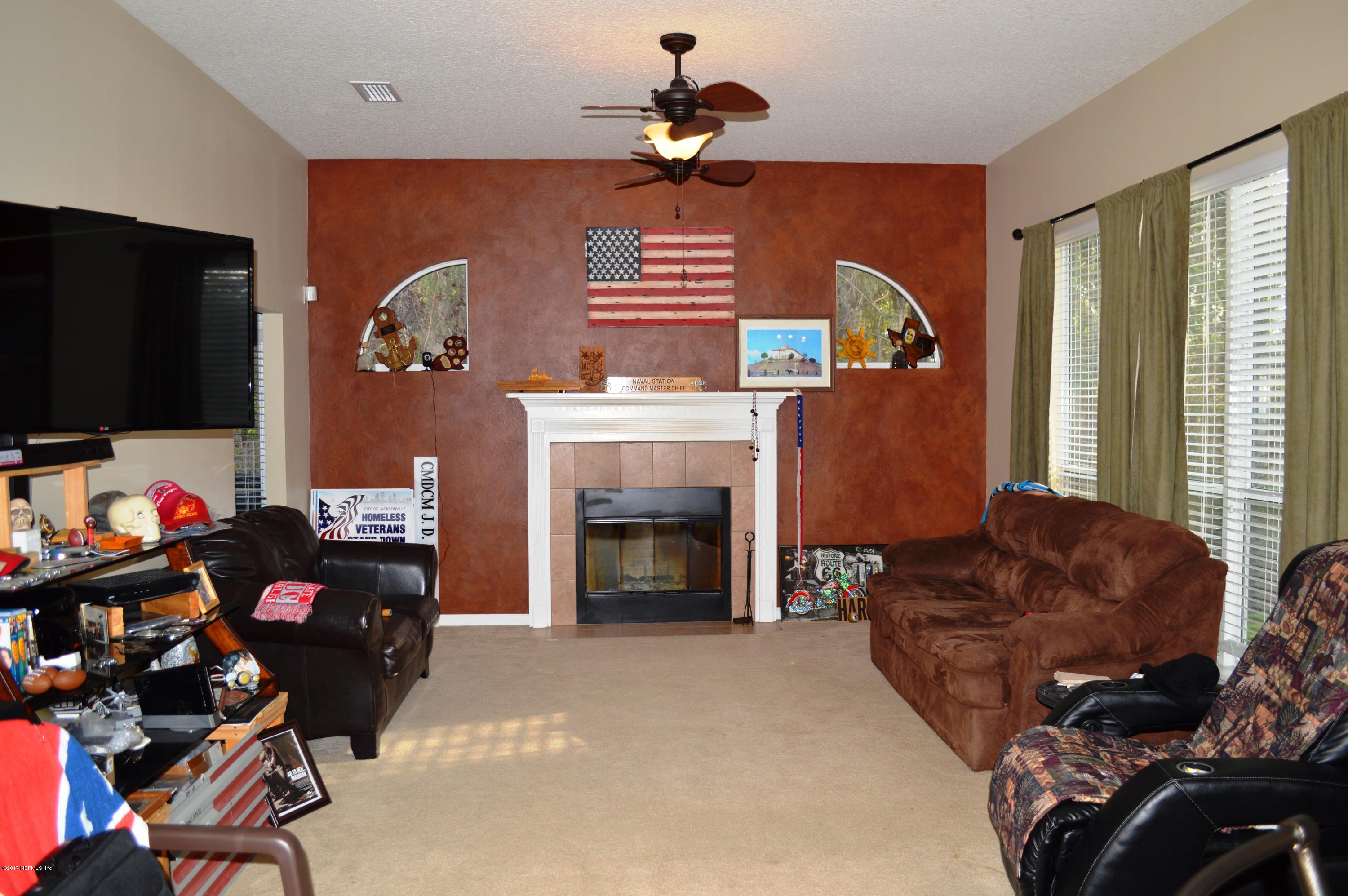 660 Reflection Cove Road Jacksonville, FL 32218 - Photo 10 of 19 Family room 1
