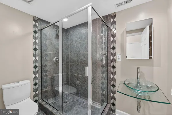 a view of a hallway with washer and dryer