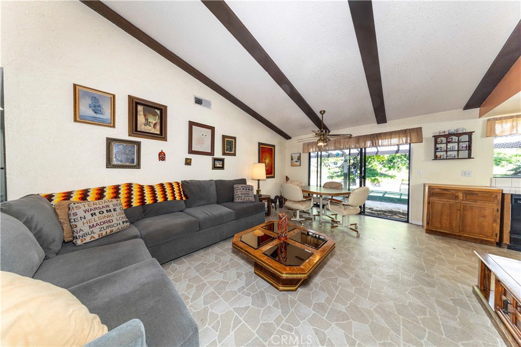 4275 Thomas Court Simi Valley, CA 93063 - Photo 11 of 59 a living room with furniture and a flat screen tv