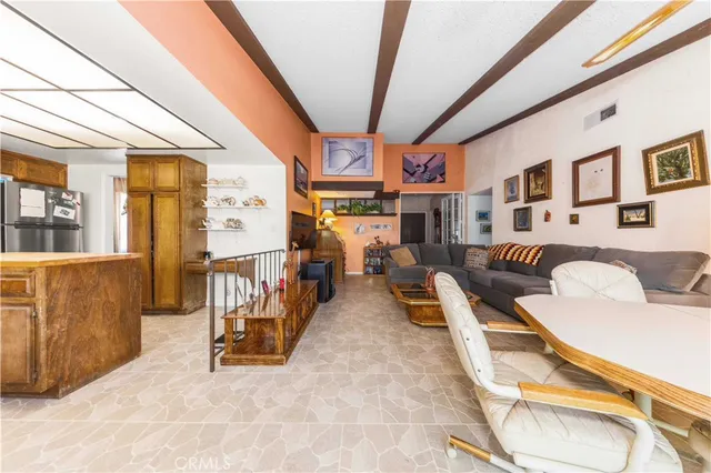 a view of a livingroom with furniture and a couch