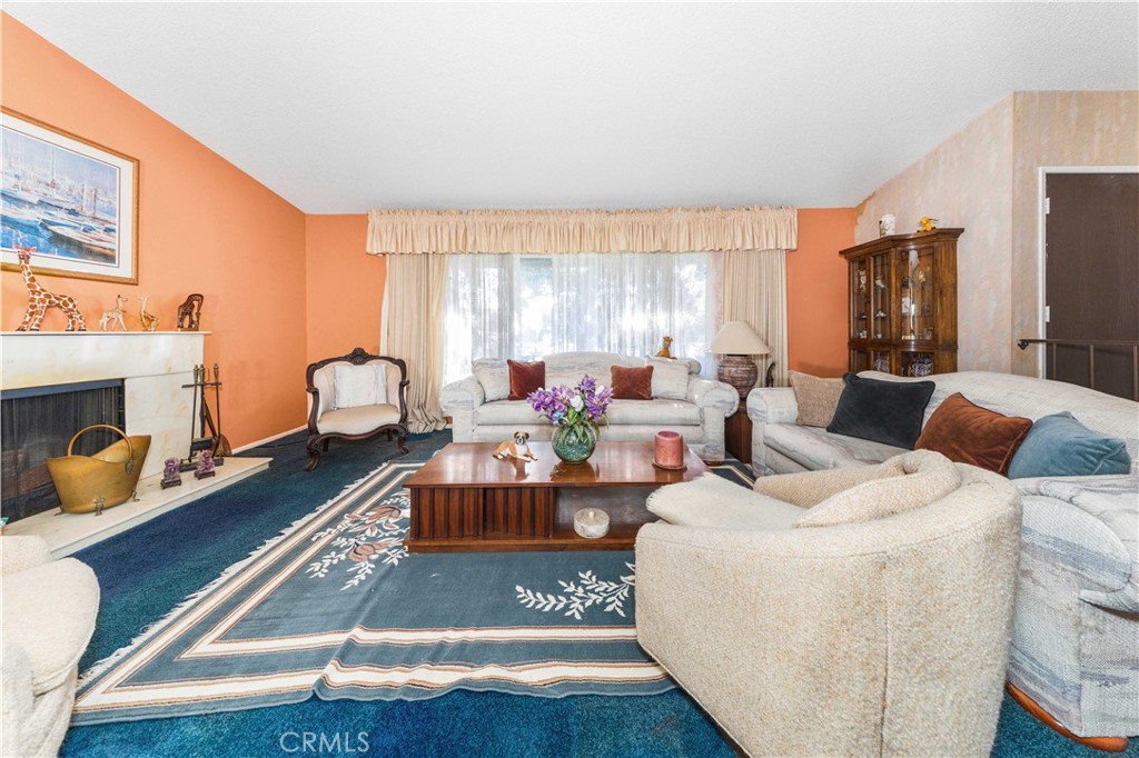 4275 Thomas Court Simi Valley, CA 93063 - Photo 20 of 59 a living room with furniture and a fireplace