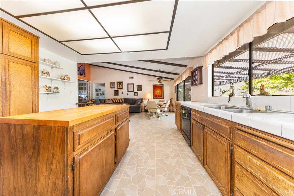 4275 Thomas Court Simi Valley, CA 93063 - Photo 26 of 59 a large white kitchen with a large window
