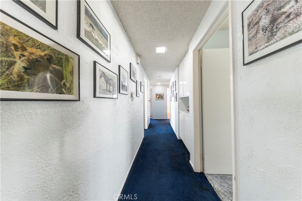 4275 Thomas Court Simi Valley, CA 93063 - Photo 28 of 59 a view of a hallway with wooden floor