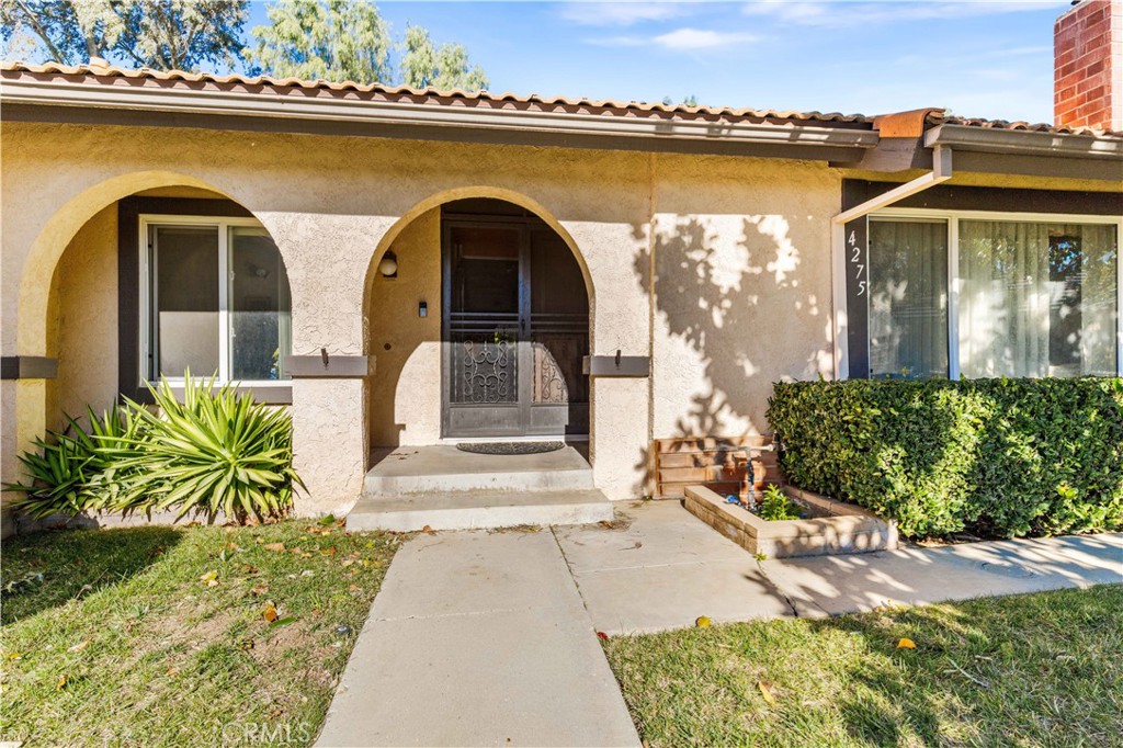 4275 Thomas Court Simi Valley, CA 93063 - Photo 3 of 59 a front view of a house with garden