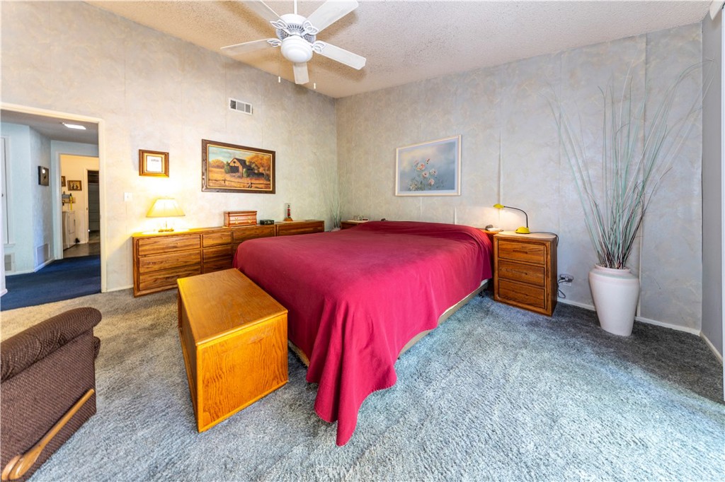 4275 Thomas Court Simi Valley, CA 93063 - Photo 31 of 59 a bedroom with a bed and a couch