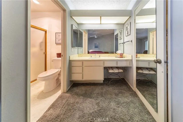 a bed room with furniture and a window