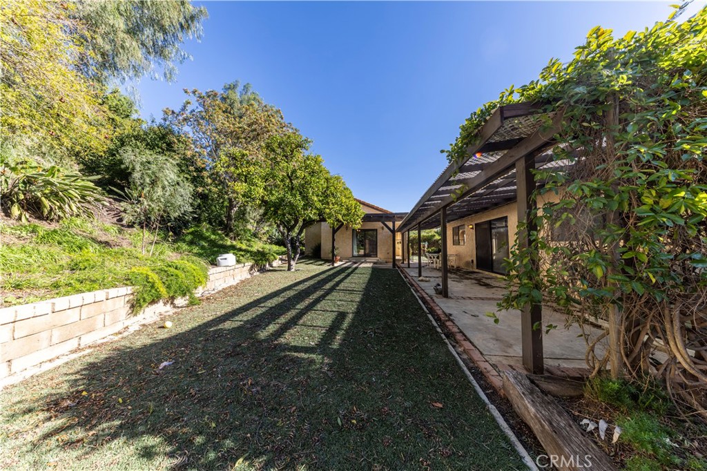 4275 Thomas Court Simi Valley, CA 93063 - Photo 46 of 59 a view of a house with a yard