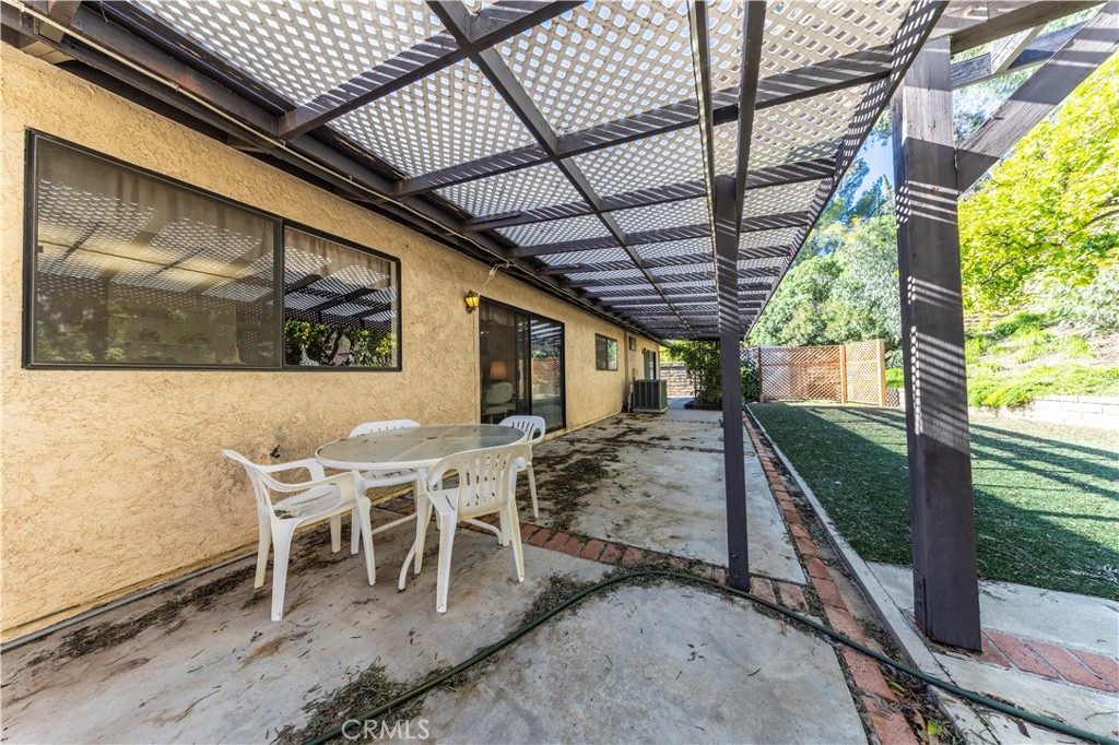 4275 Thomas Court Simi Valley, CA 93063 - Photo 47 of 59 a view of a porch with furniture and a yard