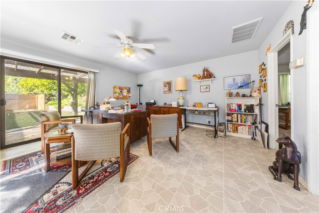 4275 Thomas Court Simi Valley, CA 93063 - Photo 51 of 59 a living room with furniture and a flat screen tv
