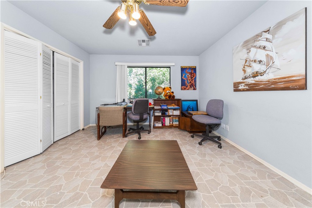 4275 Thomas Court Simi Valley, CA 93063 - Photo 52 of 59 a living room with furniture a window and a potted plant