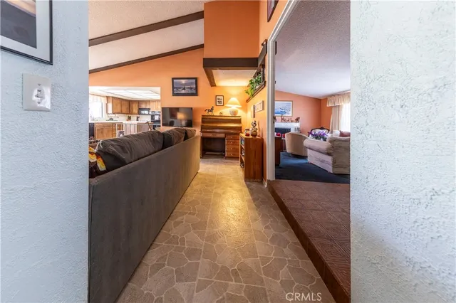 a living room with furniture and a couch