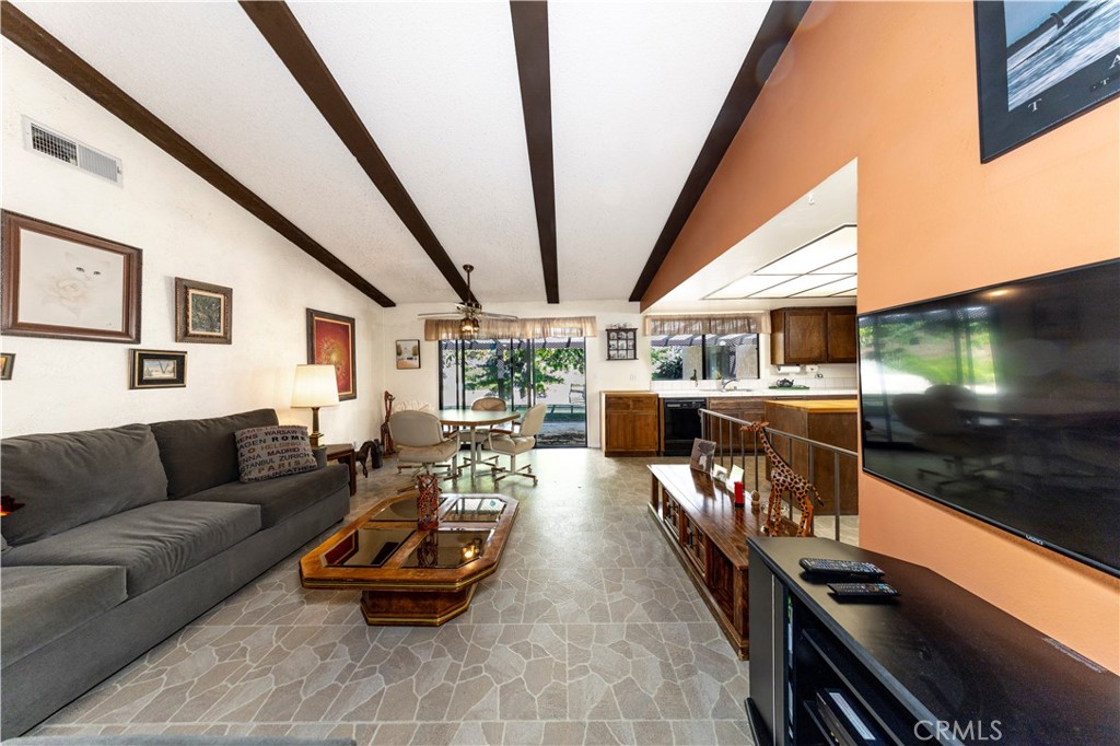 4275 Thomas Court Simi Valley, CA 93063 - Photo 10 of 59 a living room with furniture and a flat screen tv