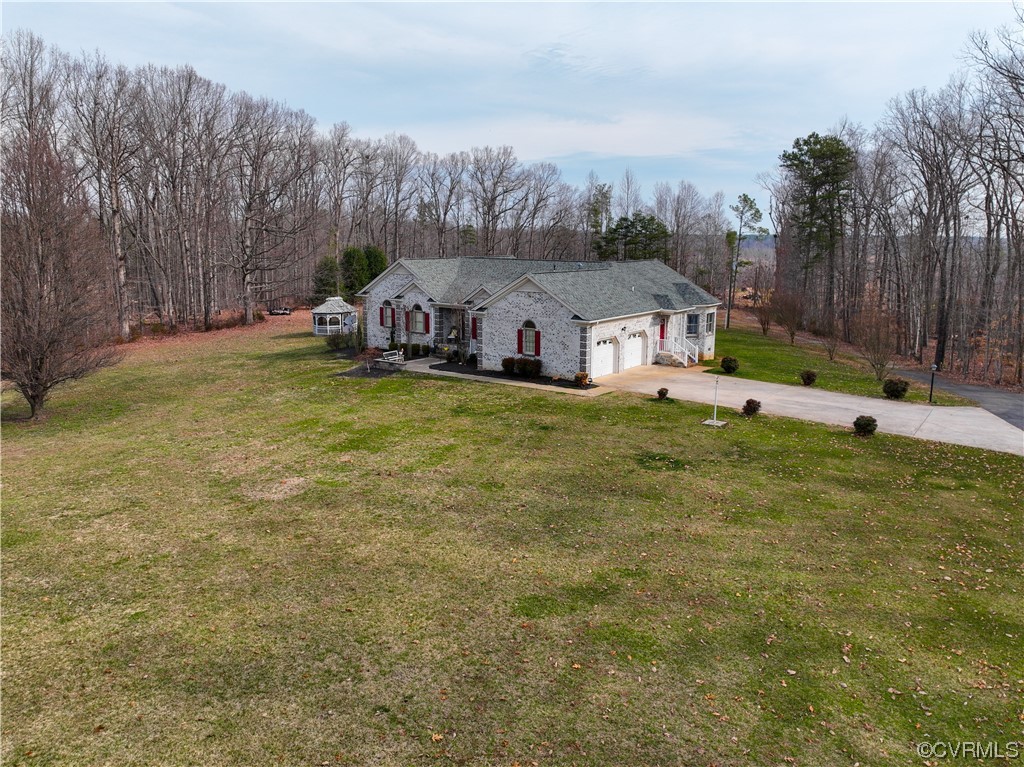 3324 Nutbush Road Victoria, VA 23974 - Photo 1 of 38 a front view of house with yard and trees in the background