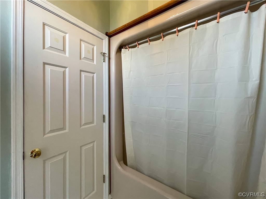 3324 Nutbush Road Victoria, VA 23974 - Photo 22 of 38 a bathroom with a shower and a mirror