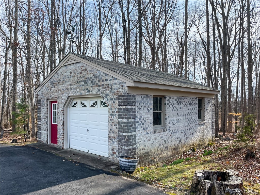 3324 Nutbush Road Victoria, VA 23974 - Photo 31 of 38 a front view of a house with a yard
