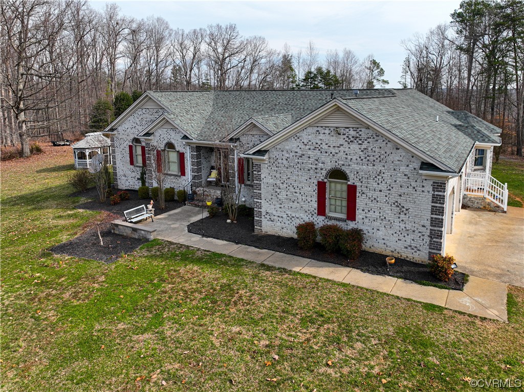 3324 Nutbush Road Victoria, VA 23974 - Photo 35 of 38 a front view of a house with a yard