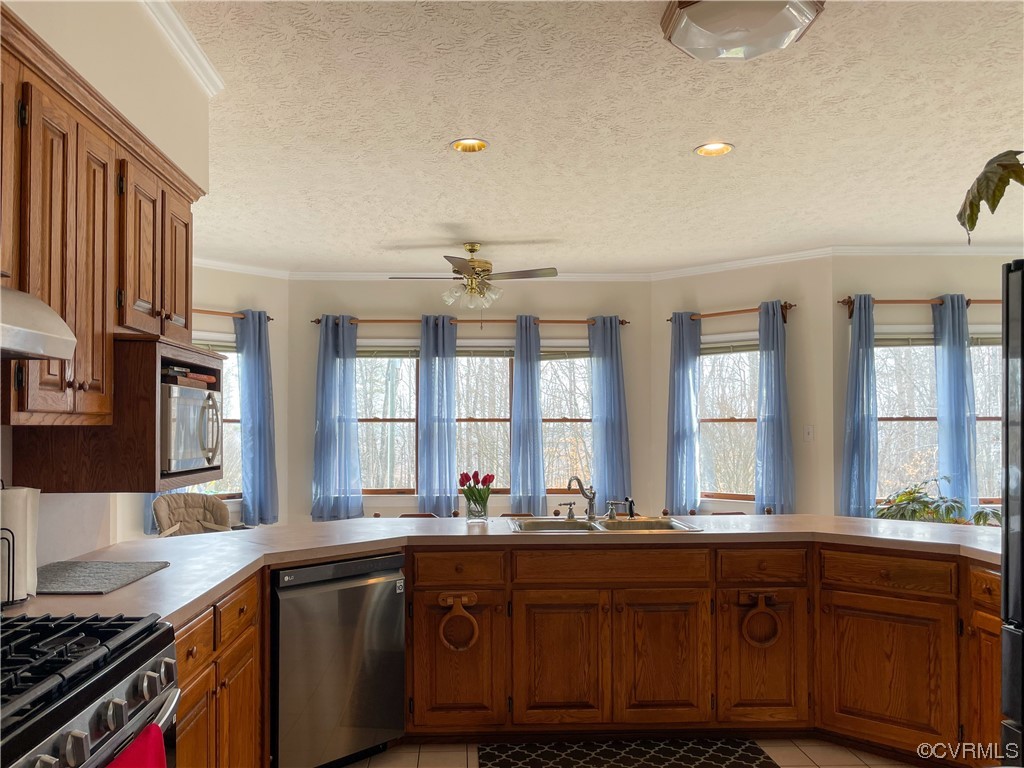 3324 Nutbush Road Victoria, VA 23974 - Photo 5 of 38 a large kitchen with granite countertop a large window and white cabinets
