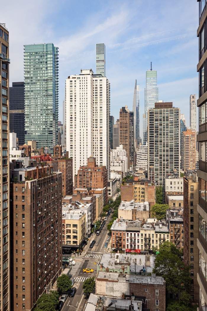 425 East 58th Street, Unit 20E Manhattan, NY 10022 - Photo 11 of 19 a view of city with tall buildings