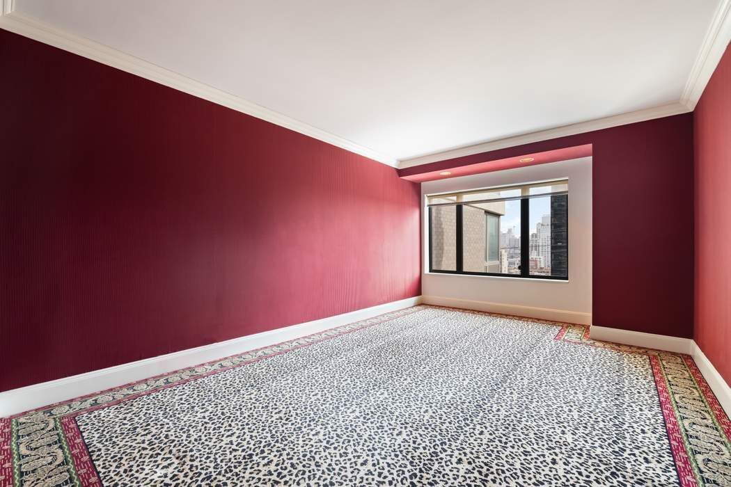 425 East 58th Street, Unit 20E Manhattan, NY 10022 - Photo 10 of 19 a view of an empty room