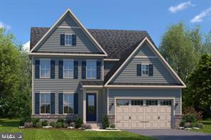 a front view of a house with yard