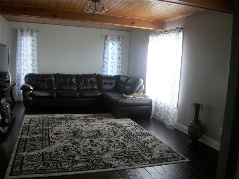 137 Long Street Rices Landing, PA 15357 - Photo 11 of 23 Great Room. LIVING/FAMILY ROOM WITH BURCH FLOORING