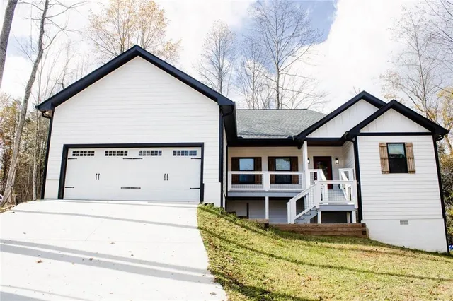 a view of a house with large windows