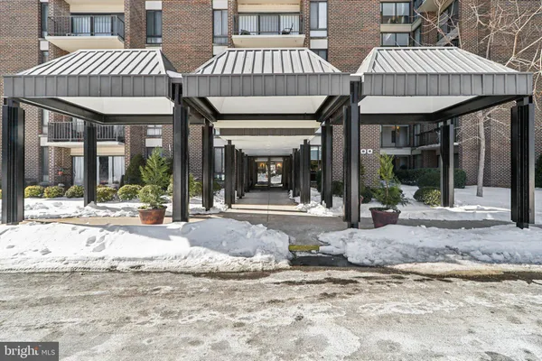 a view of a brick building with a large windows