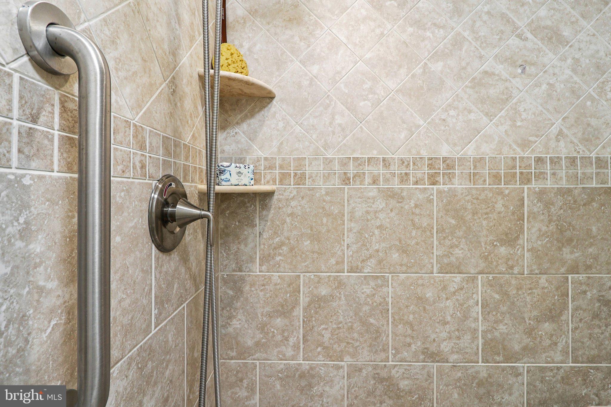 9900 Georgia Avenue, Unit 27217 Silver Spring, MD 20902 - Photo 40 of 48 Beautiful tiled shower