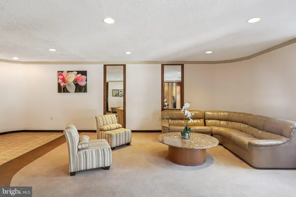 a living room with furniture and a couch