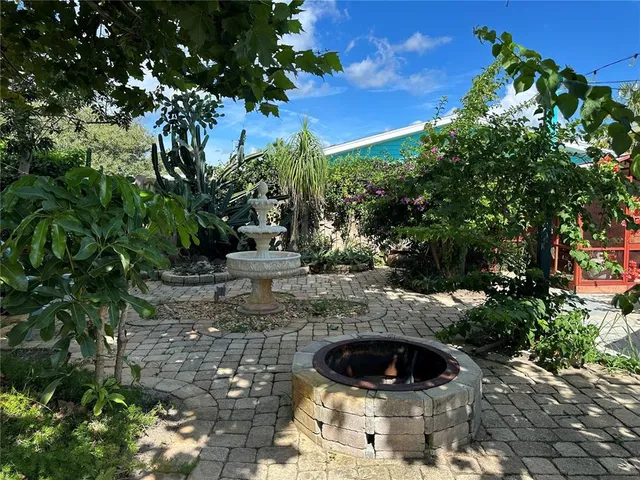 a view of a garden from a balcony