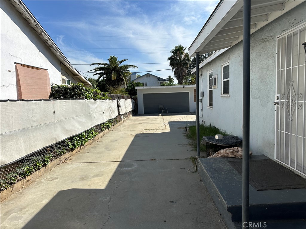 3432 Russell Street Riverside, CA 92501 - Photo 3 of 20 Long Drive way heading to Garage and ADU