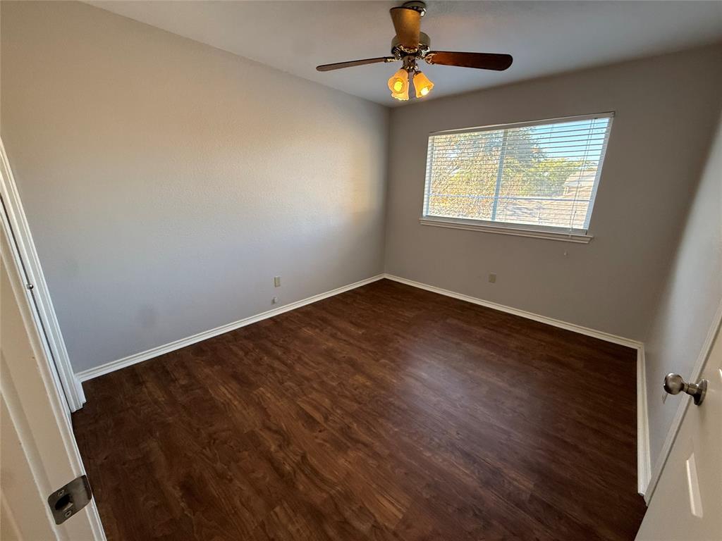 7913 Rice Drive Rowlett, TX 75088 - Photo 20 of 20 a view of an empty room with a window