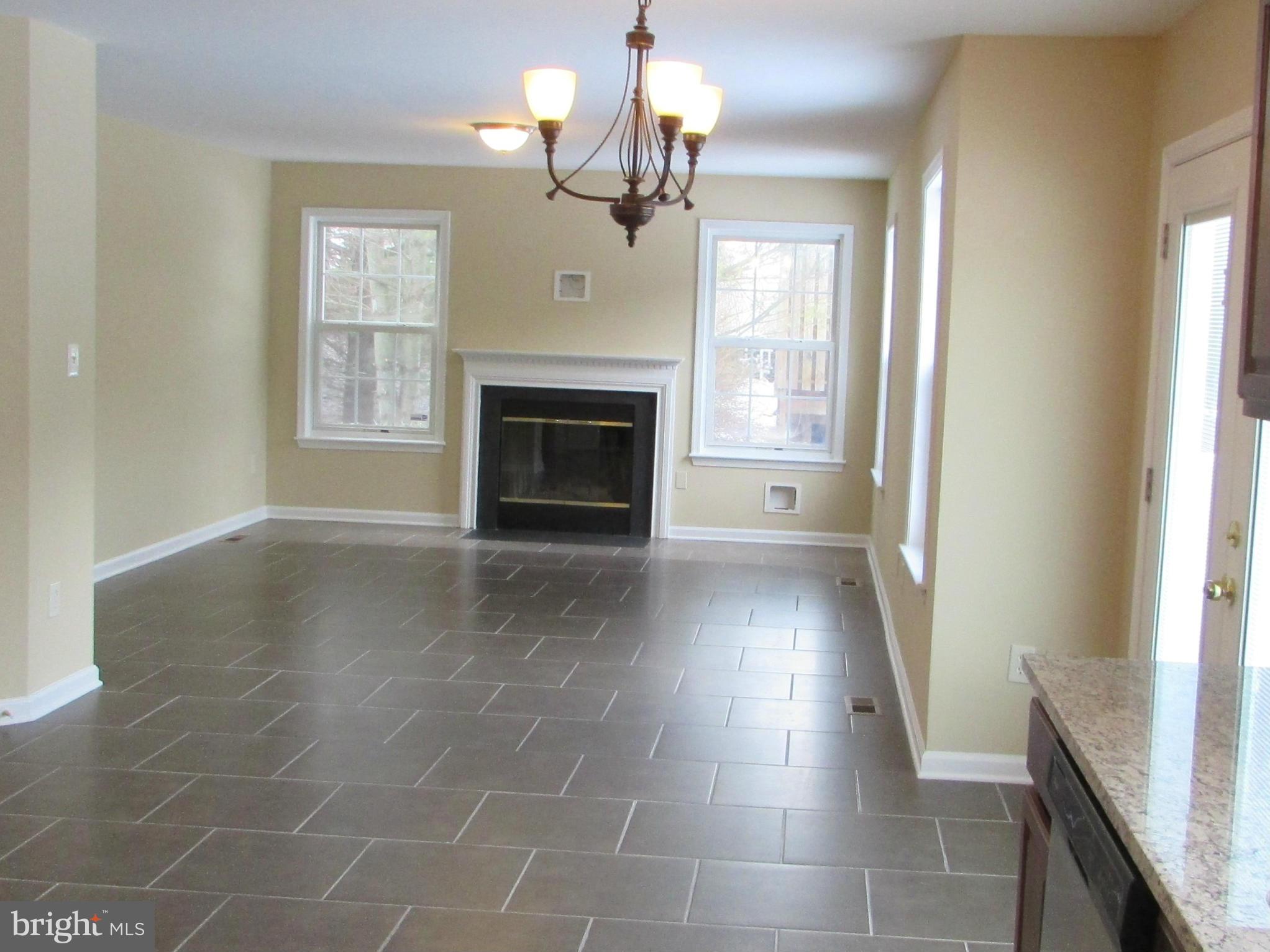 1780 Bennett Road Sykesville, MD 21784 - Photo 11 of 27 Family Room with fireplace from kitchen