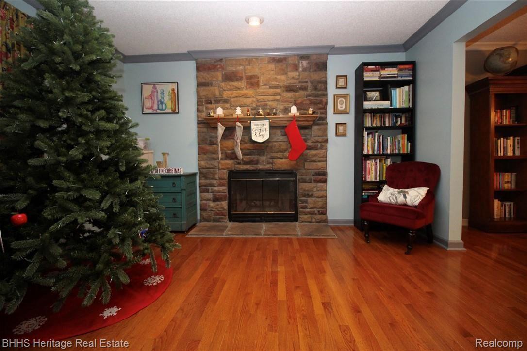 2403 North Latson Road Howell, MI 48855 - Photo 11 of 31 Stone fireplace
