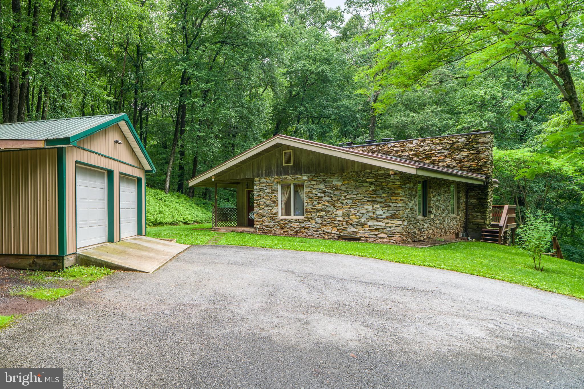 135 Fraelich Road Denver, PA 17517 - Photo 13 of 53 a view of a house with a yard and large tree