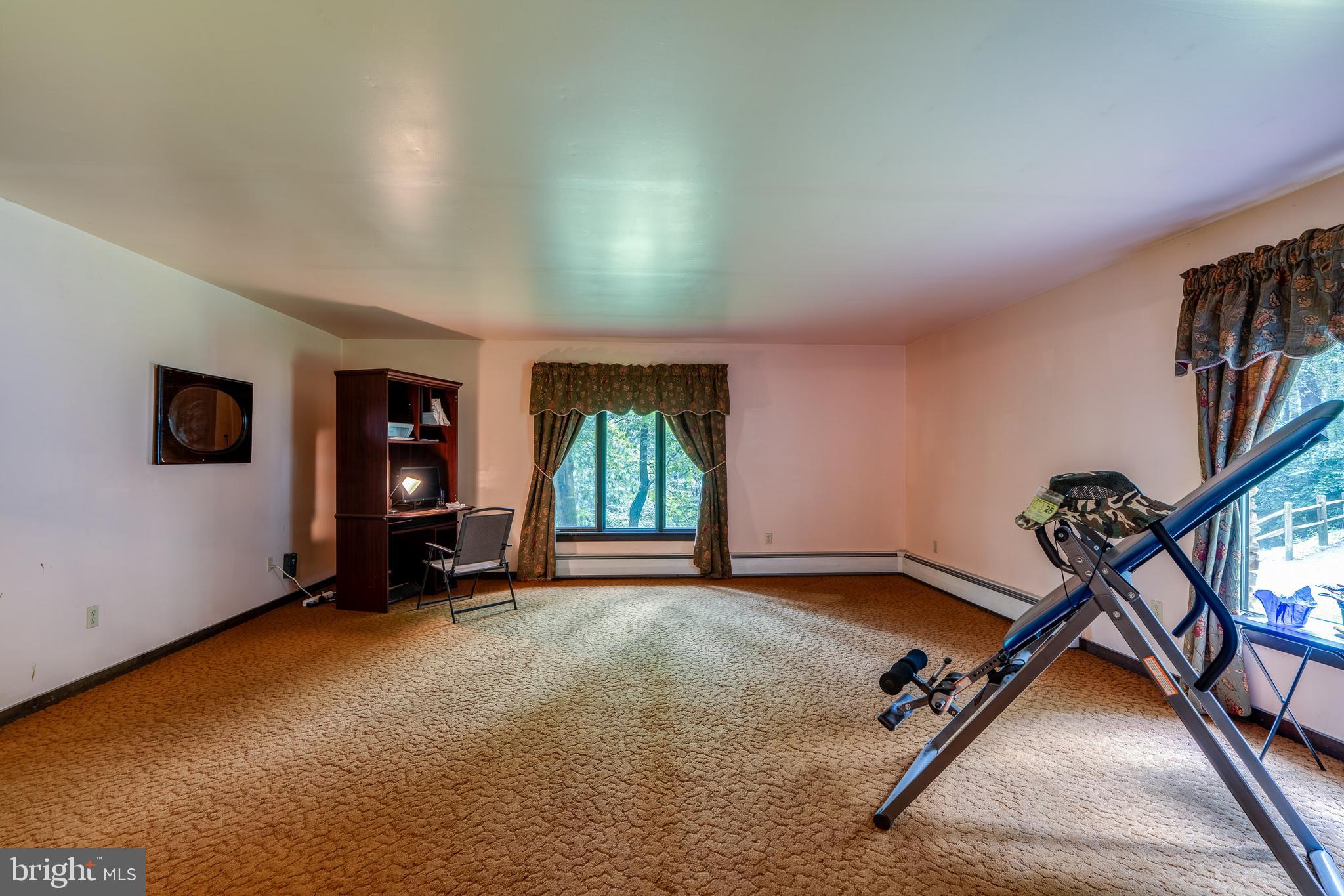 135 Fraelich Road Denver, PA 17517 - Photo 16 of 53 an empty room with windows