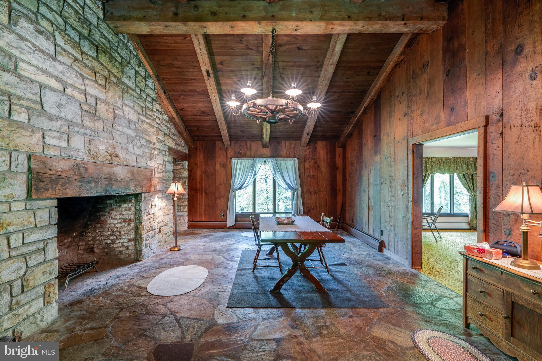 135 Fraelich Road Denver, PA 17517 - Photo 20 of 53 a living room with furniture and a fireplace