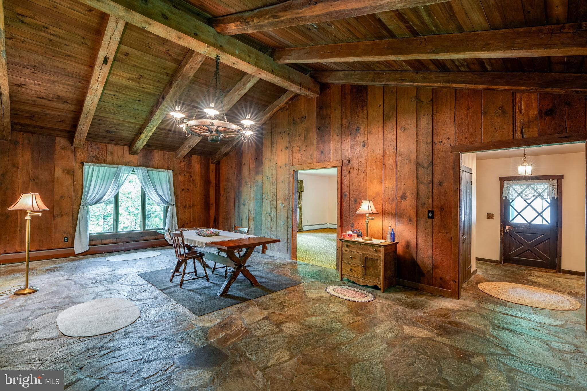 135 Fraelich Road Denver, PA 17517 - Photo 24 of 53 a view of a dining room with furniture and chandelier