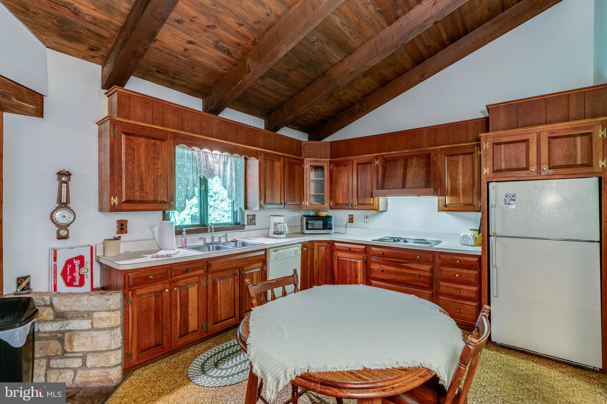 135 Fraelich Road Denver, PA 17517 - Photo 26 of 53 a kitchen with a sink appliances and cabinets