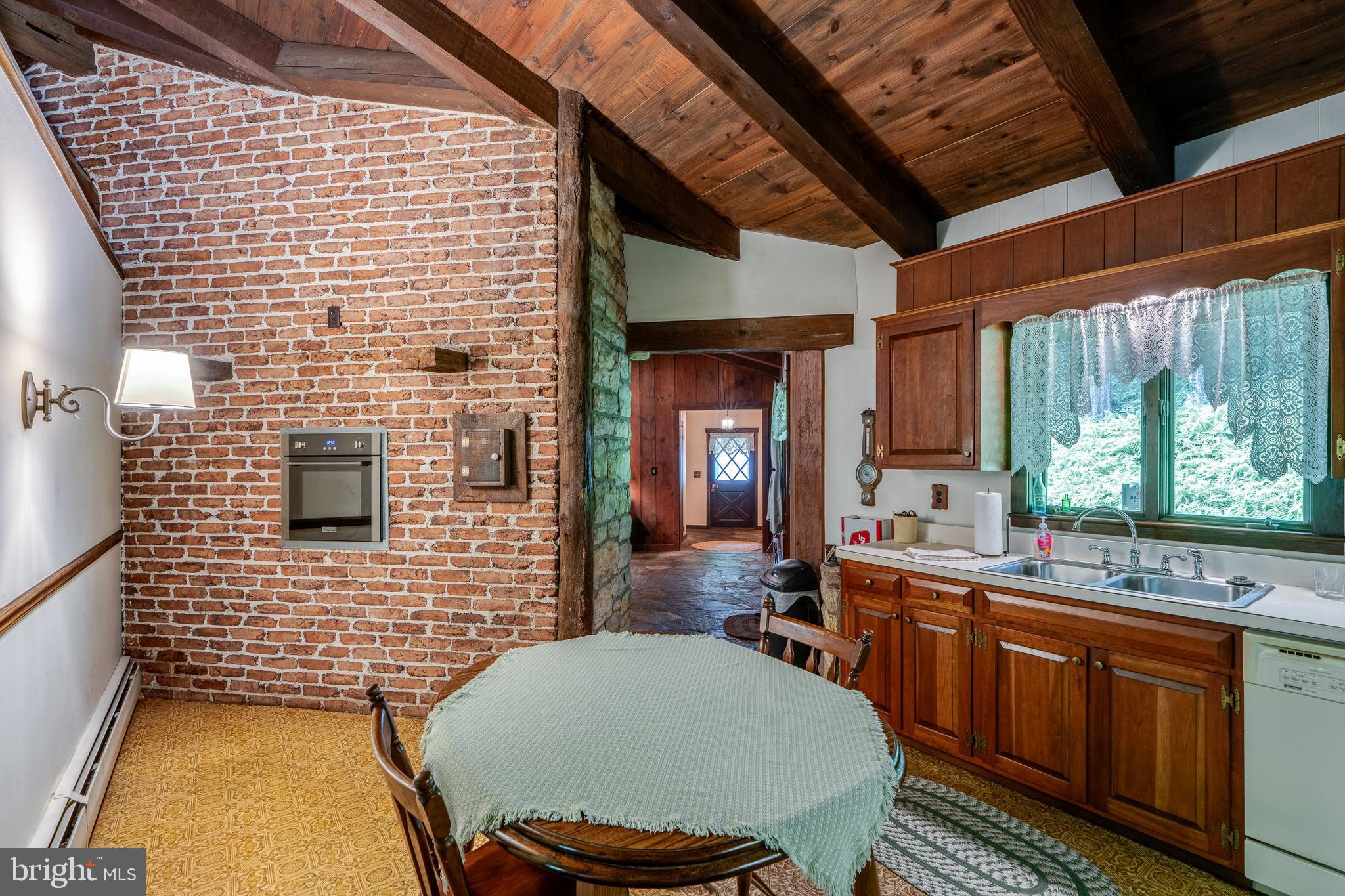 135 Fraelich Road Denver, PA 17517 - Photo 28 of 53 a bathroom with a sink a toilet a mirror and window
