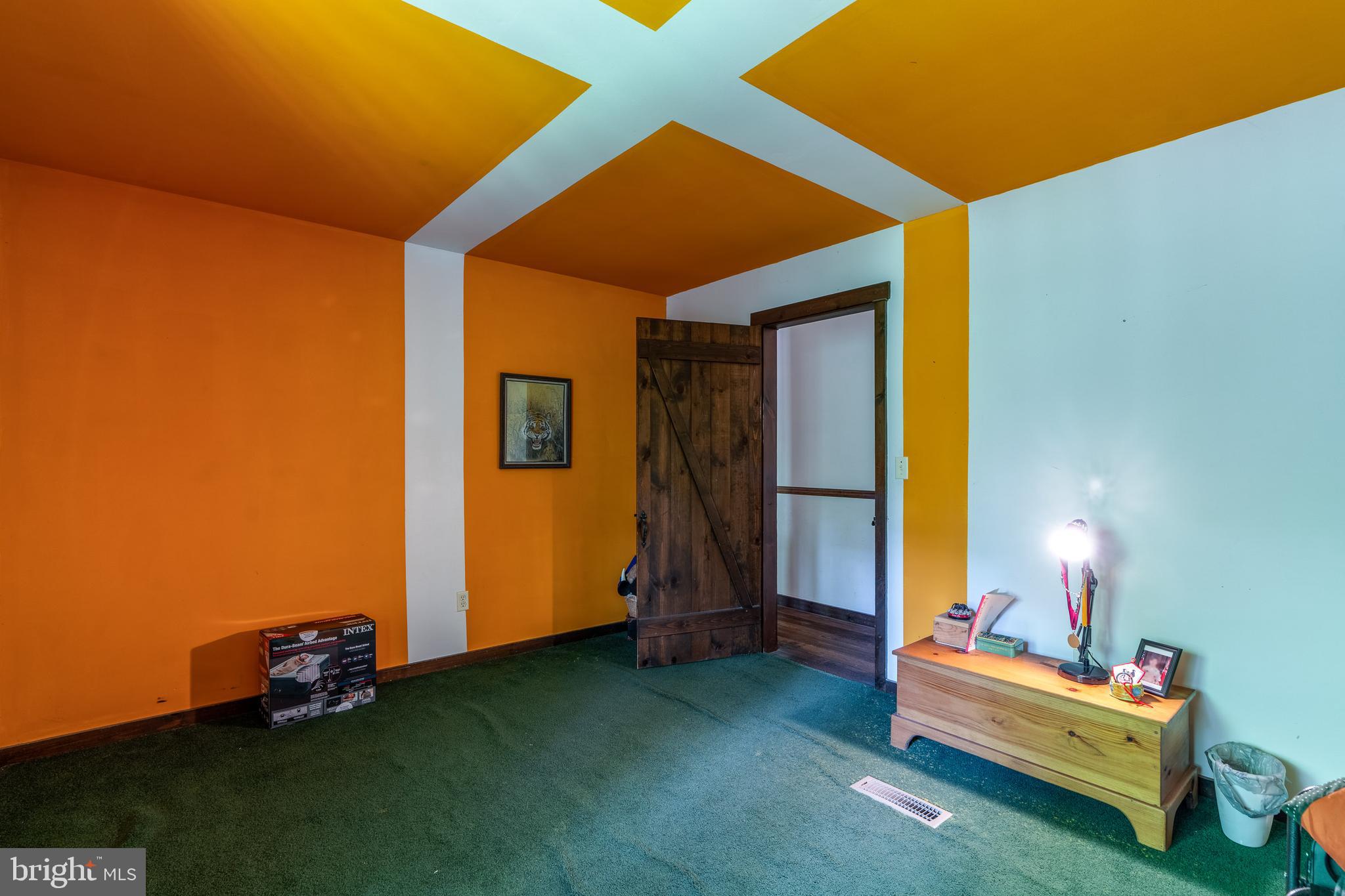 135 Fraelich Road Denver, PA 17517 - Photo 33 of 53 a bed room with a bed and a window