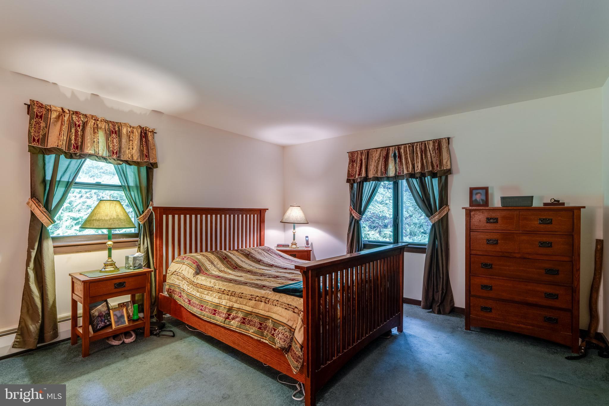 135 Fraelich Road Denver, PA 17517 - Photo 37 of 53 a bed room with a bed and a window