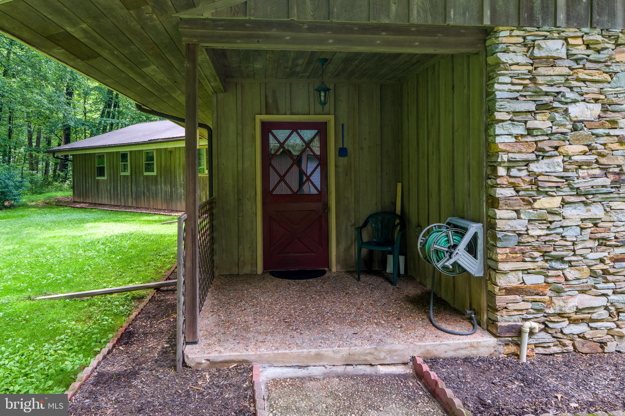 135 Fraelich Road Denver, PA 17517 - Photo 4 of 53 a backyard of a house with seating space