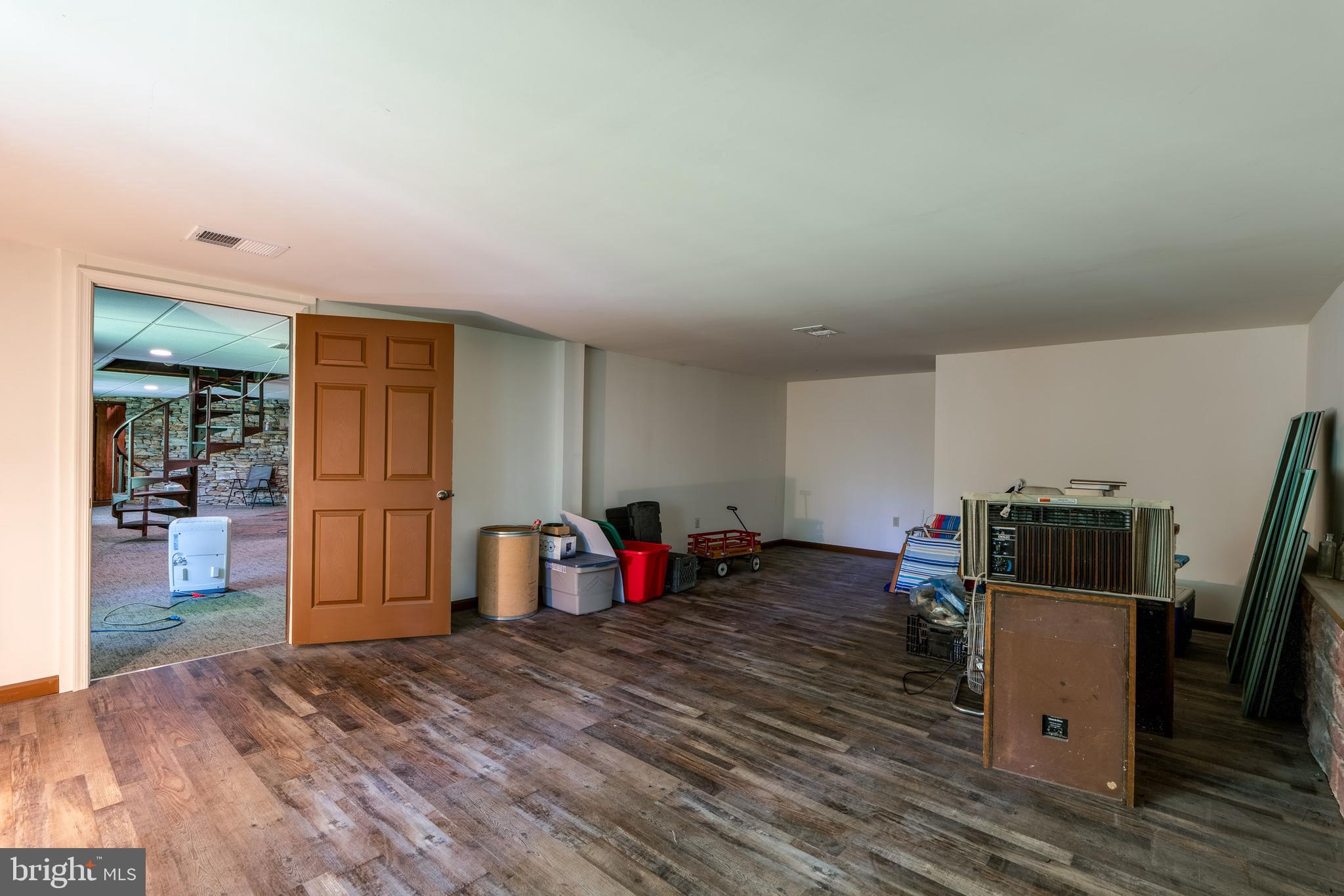 135 Fraelich Road Denver, PA 17517 - Photo 50 of 53 a view of a workspace with furniture and wooden floor