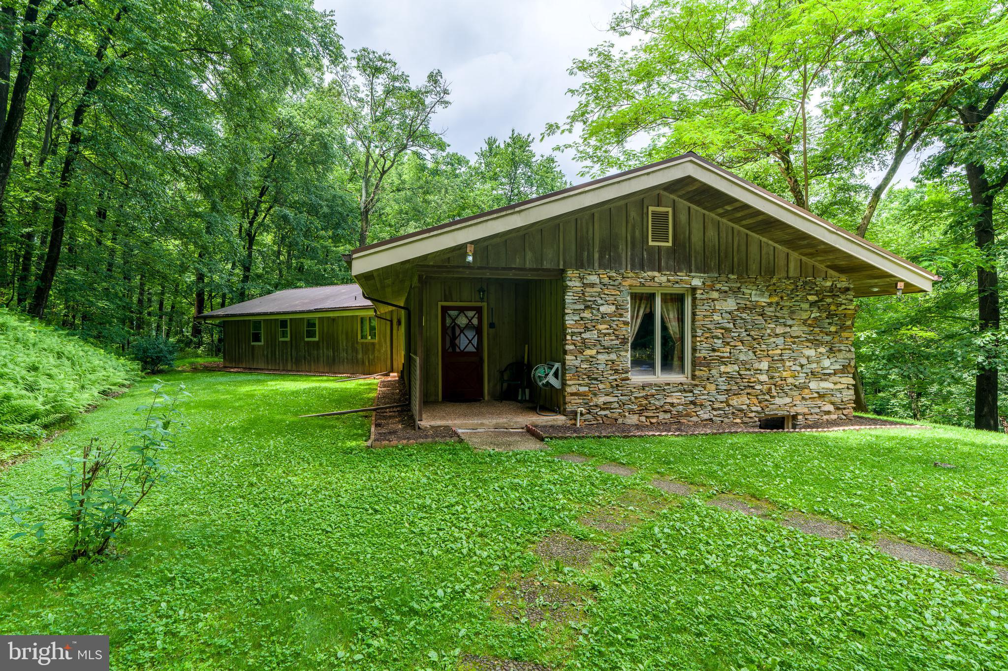 135 Fraelich Road Denver, PA 17517 - Photo 8 of 53 a front view of a house with a yard