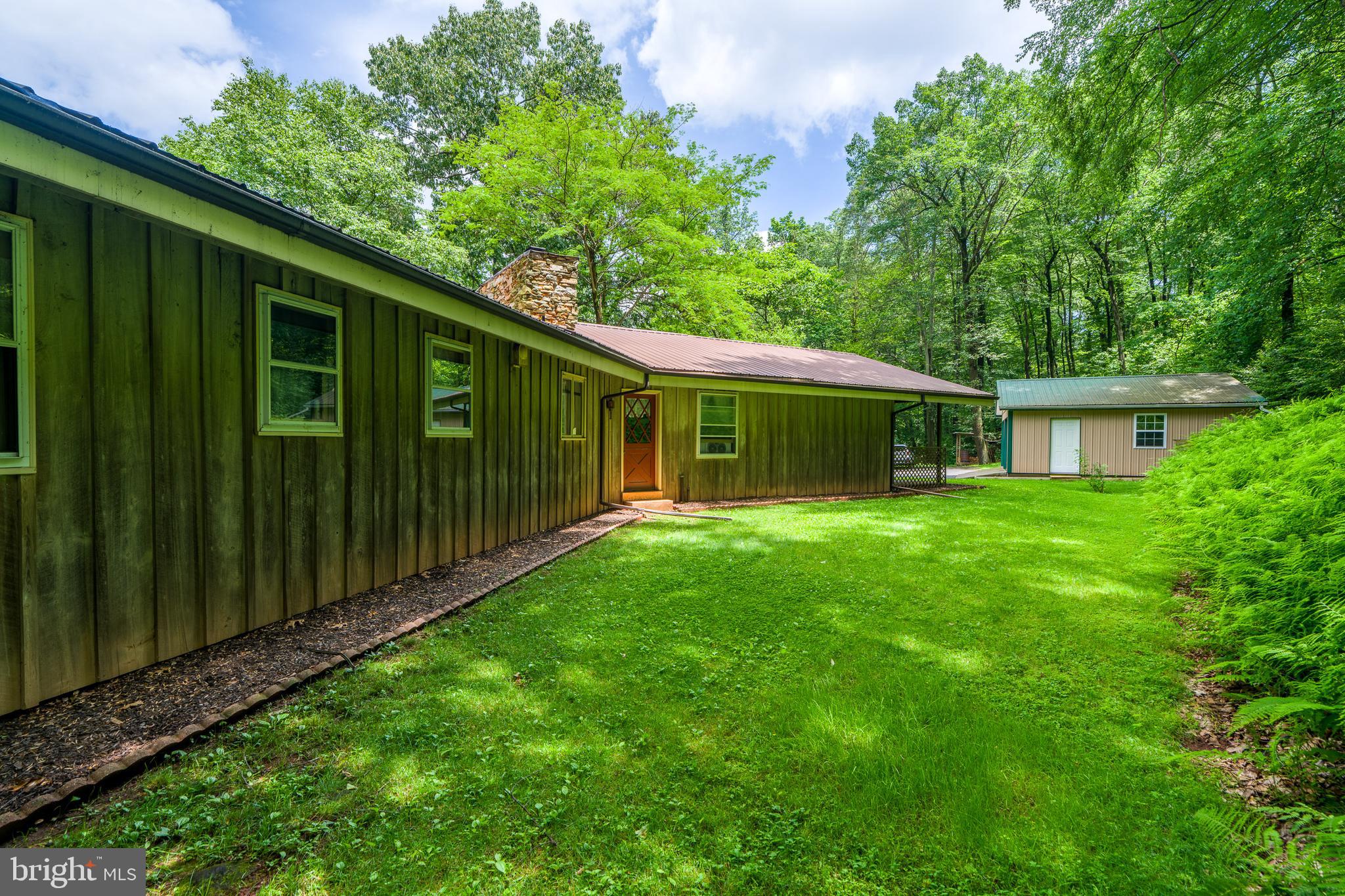 135 Fraelich Road Denver, PA 17517 - Photo 9 of 53 a view of a house with backyard and garden
